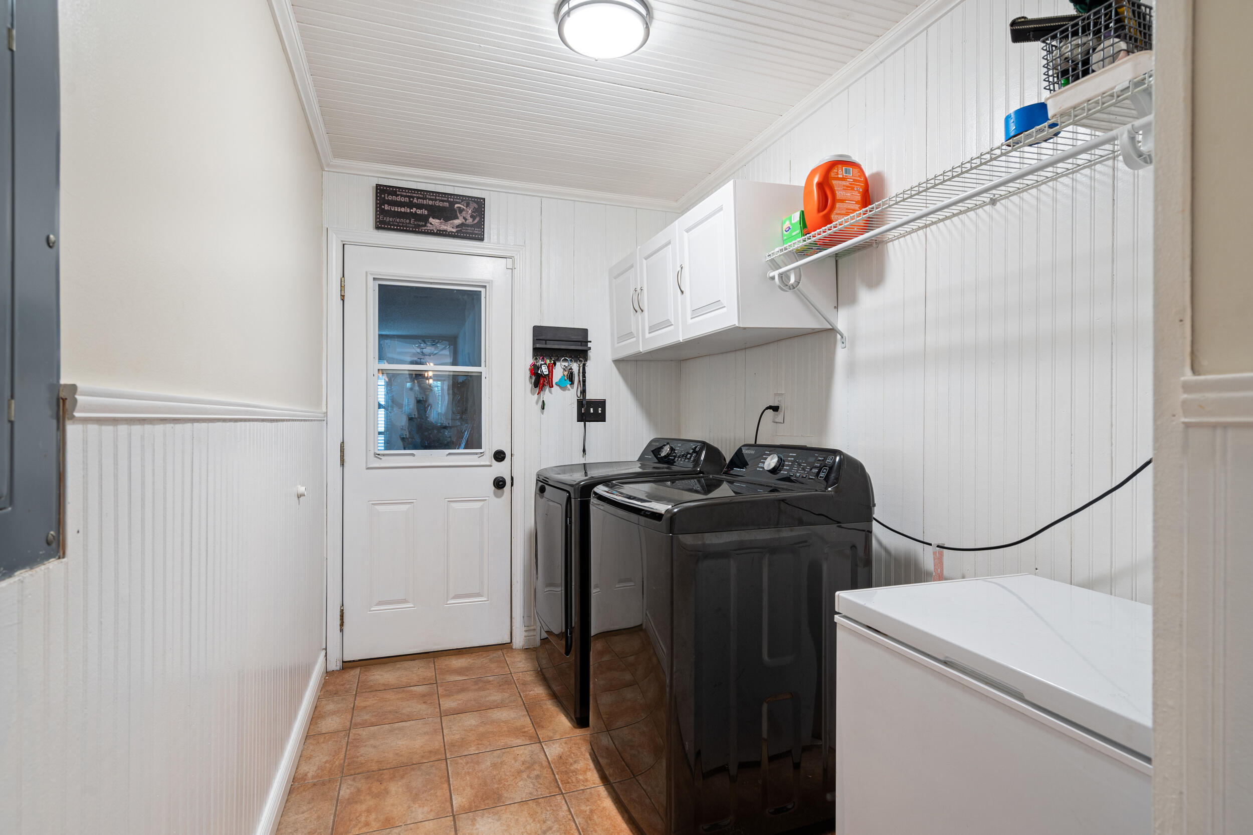 2852 Atoka Trail Crestview, FL 32539 - Photo 30 of 43 a view of storage and utility room with washer and dryer