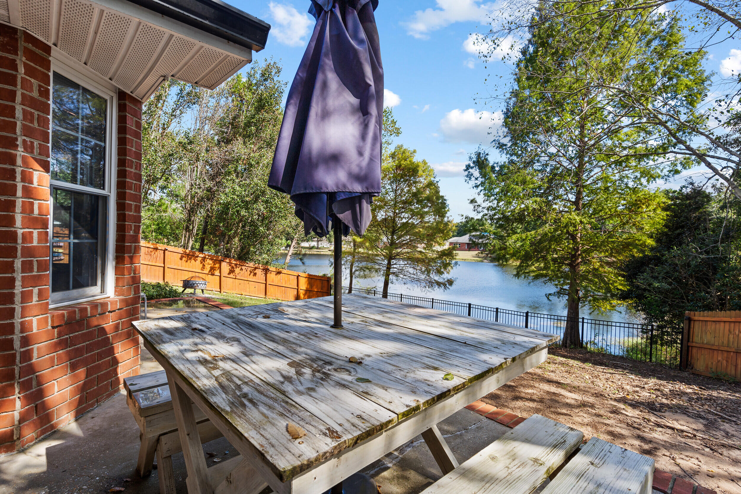 2852 Atoka Trail Crestview, FL 32539 - Photo 33 of 43 a view of a backyard with a sitting area