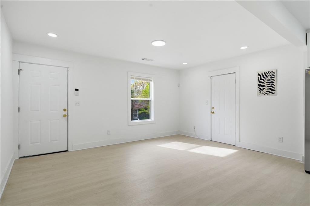 1458 Olive Street Southwest Atlanta, GA 30310 - Photo 14 of 38 a view of an empty room with a window