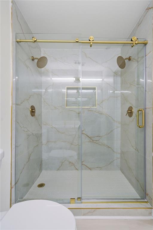 1458 Olive Street Southwest Atlanta, GA 30310 - Photo 20 of 38 a bathroom with a shower and toilet