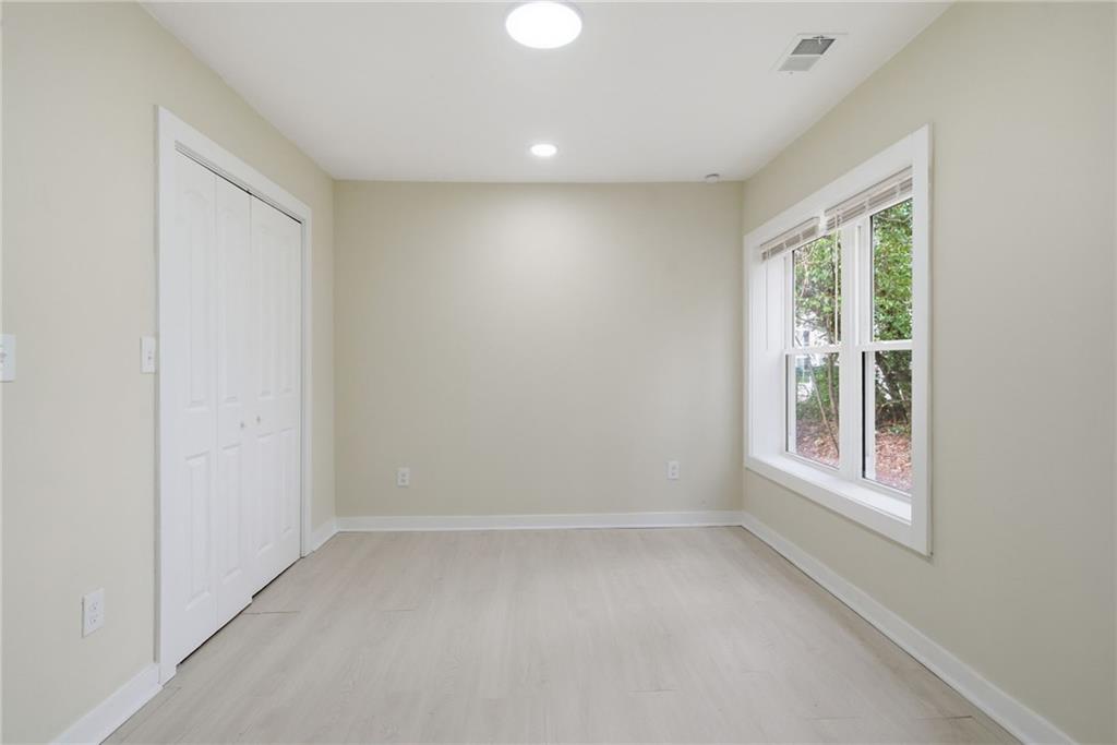 1458 Olive Street Southwest Atlanta, GA 30310 - Photo 21 of 38 a view of an empty room with a window