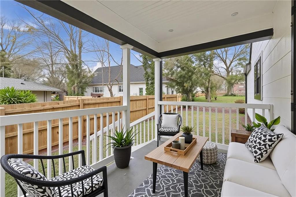1458 Olive Street Southwest Atlanta, GA 30310 - Photo 6 of 38 a view of a balcony with furniture
