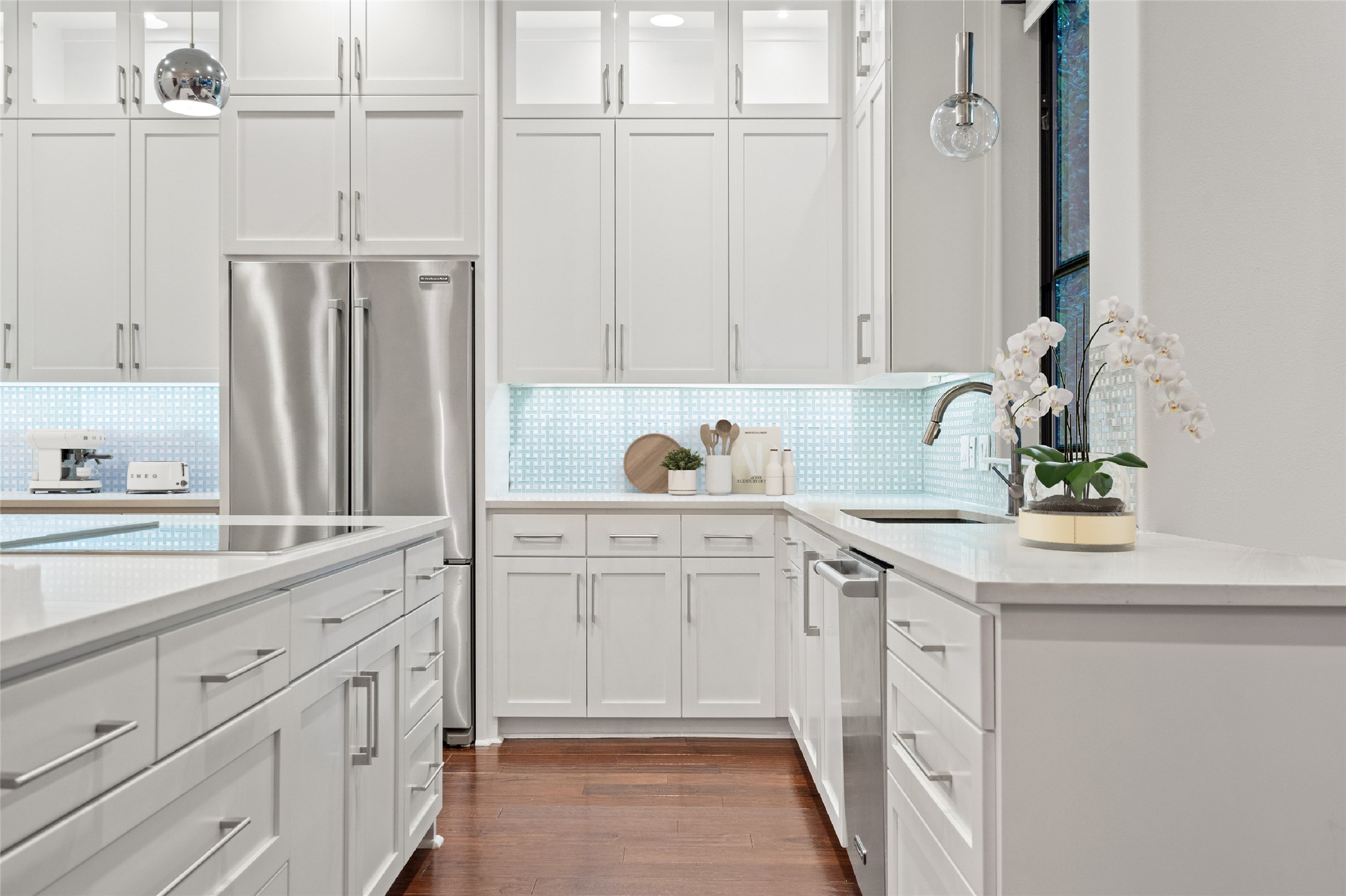 2811 Del Curto Road, Unit A Austin, TX 78704 - Photo 12 of 40 a kitchen with white cabinets and sink