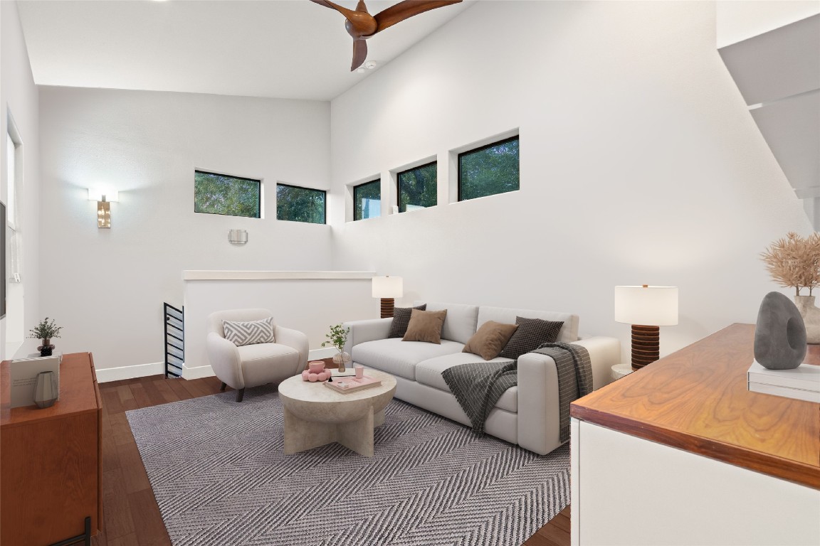 2811 Del Curto Road, Unit A Austin, TX 78704 - Photo 18 of 40 Living room with dark wood finished floors and high vaulted ceiling