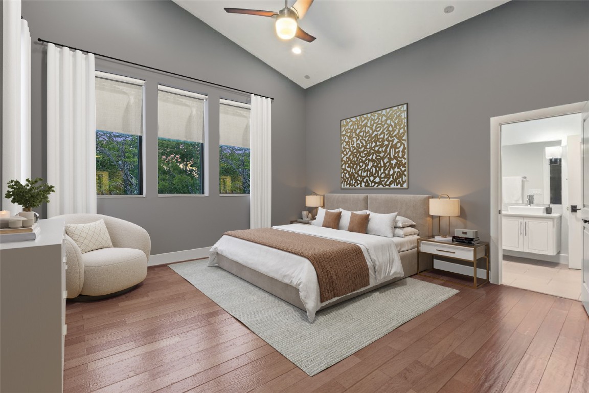 2811 Del Curto Road, Unit A Austin, TX 78704 - Photo 21 of 40 Primary bedroom featuring hardwood / wood-style flooring, vaulted ceiling, ceiling fan, ensuite bathroom, and recessed lighting