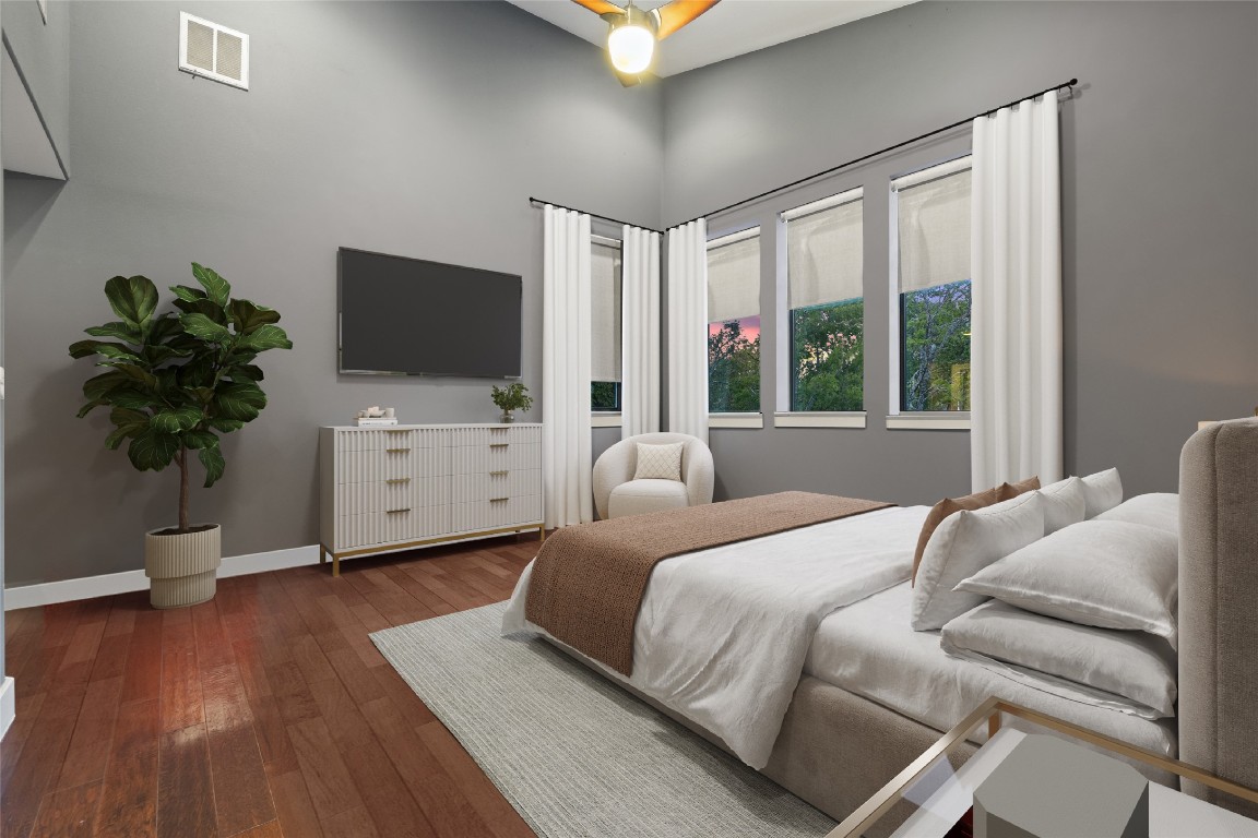 2811 Del Curto Road, Unit A Austin, TX 78704 - Photo 22 of 40 Primary bedroom featuring hardwood / wood-style flooring and baseboards