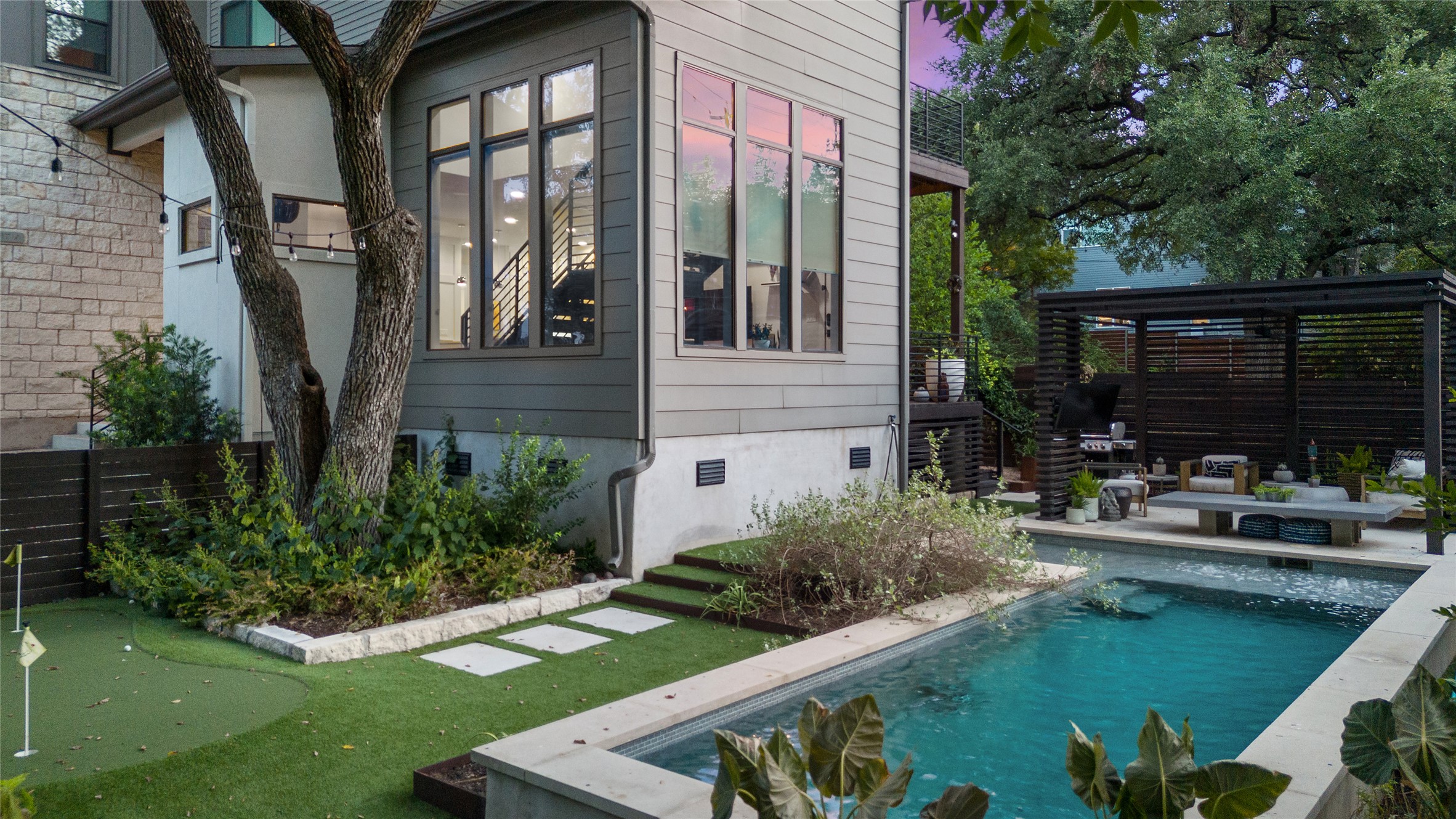 2811 Del Curto Road, Unit A Austin, TX 78704 - Photo 30 of 40 a view of house with yard outdoor seating and green space
