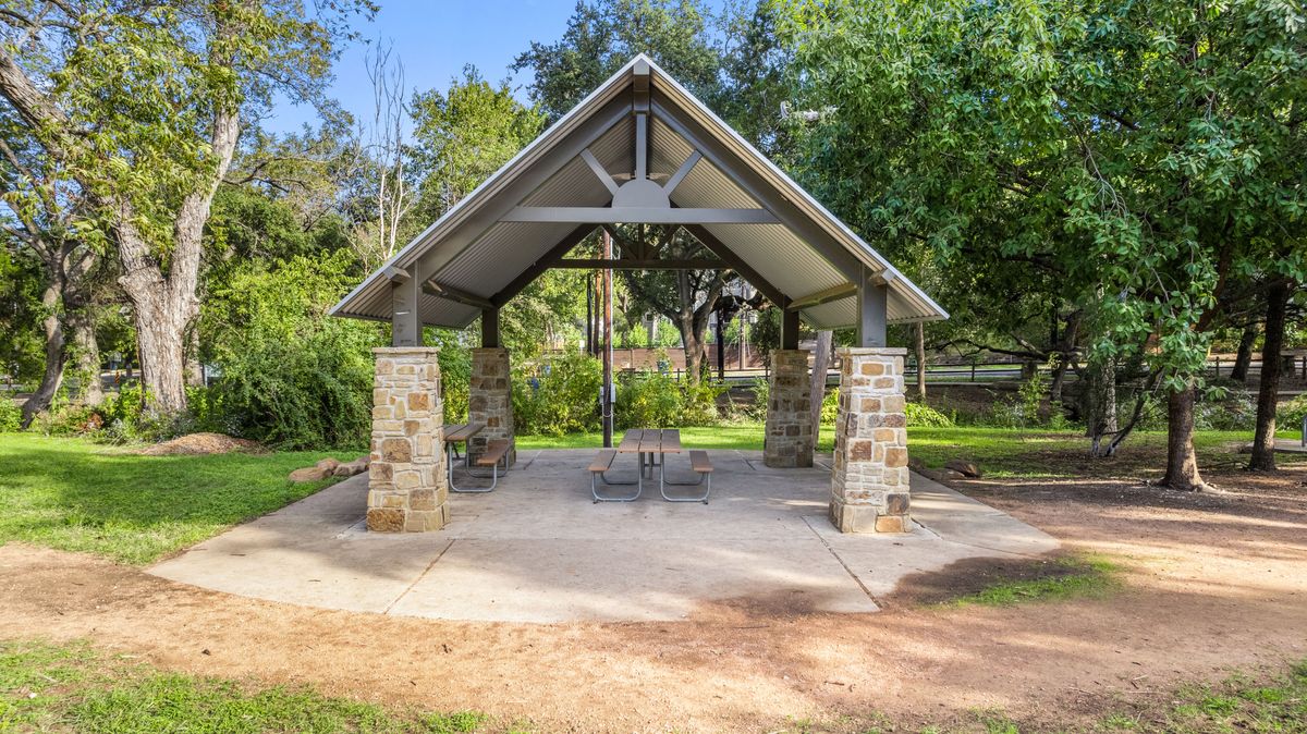 2811 Del Curto Road, Unit A Austin, TX 78704 - Photo 36 of 40 View of community with a patio and a lawn