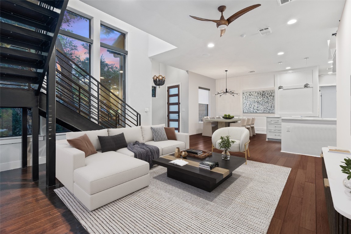 2811 Del Curto Road, Unit A Austin, TX 78704 - Photo 8 of 40 Living room featuring dark wood-style flooring, ceiling fan, recessed lighting, a chandelier, and plenty of natural light