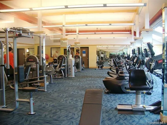 a view of a chairs and tables in the patio