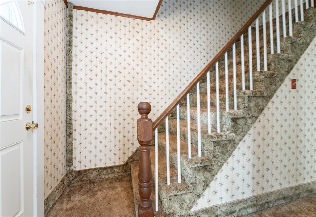 86 Epping Street Lowell, MA 01852 - Photo 23 of 41 a view of entryway with wooden floor