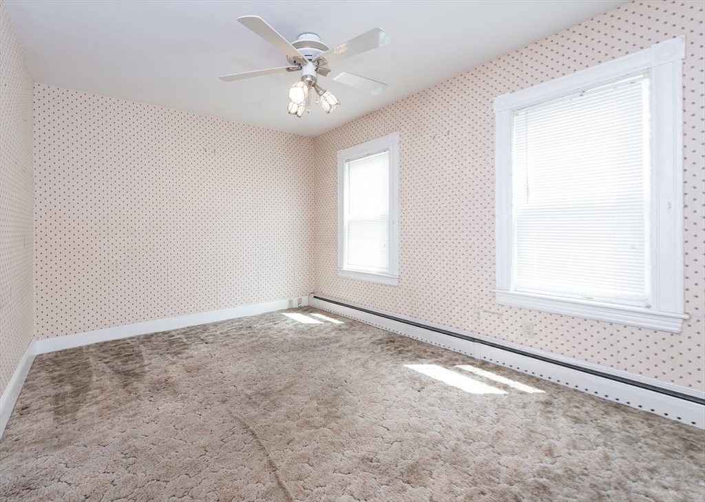 86 Epping Street Lowell, MA 01852 - Photo 26 of 41 an empty room with a window