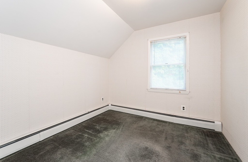 86 Epping Street Lowell, MA 01852 - Photo 28 of 41 an empty room with a window