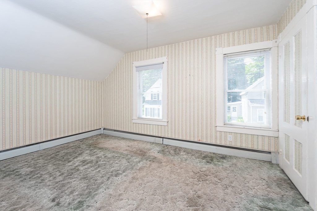86 Epping Street Lowell, MA 01852 - Photo 30 of 41 an empty room with windows