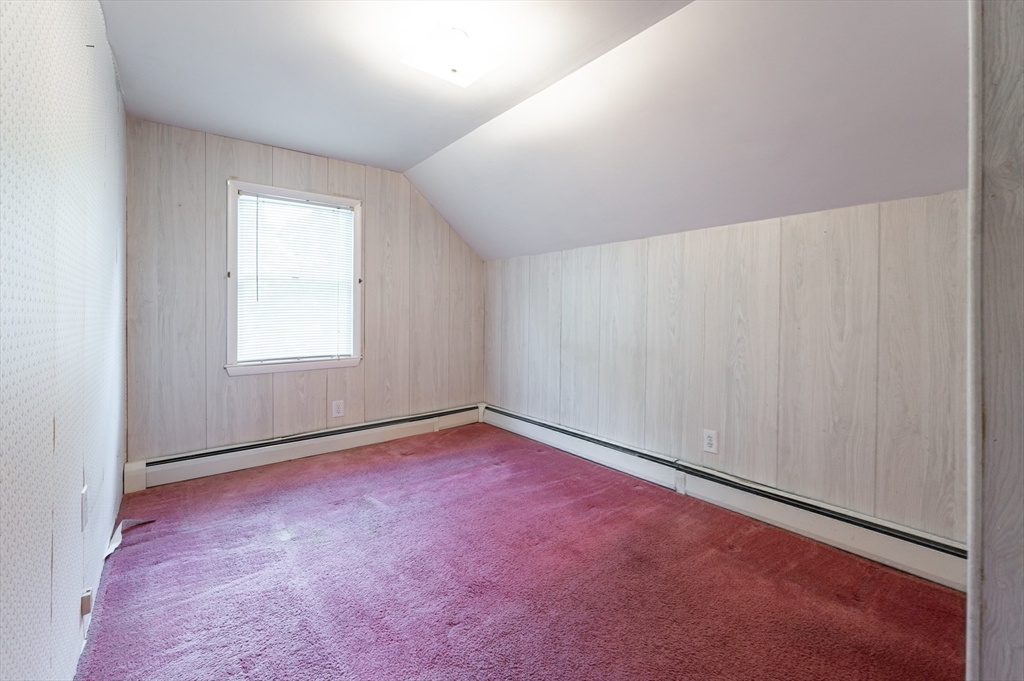 86 Epping Street Lowell, MA 01852 - Photo 31 of 41 an empty room with a empty space and a window