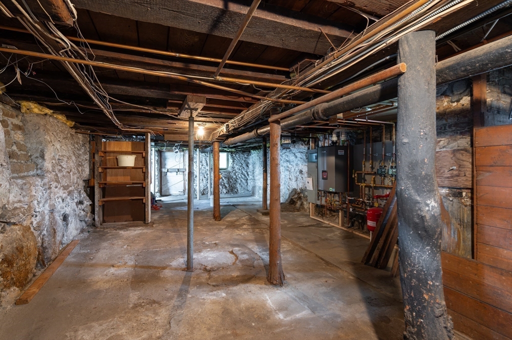 86 Epping Street Lowell, MA 01852 - Photo 36 of 41 a view of a room with gym equipment