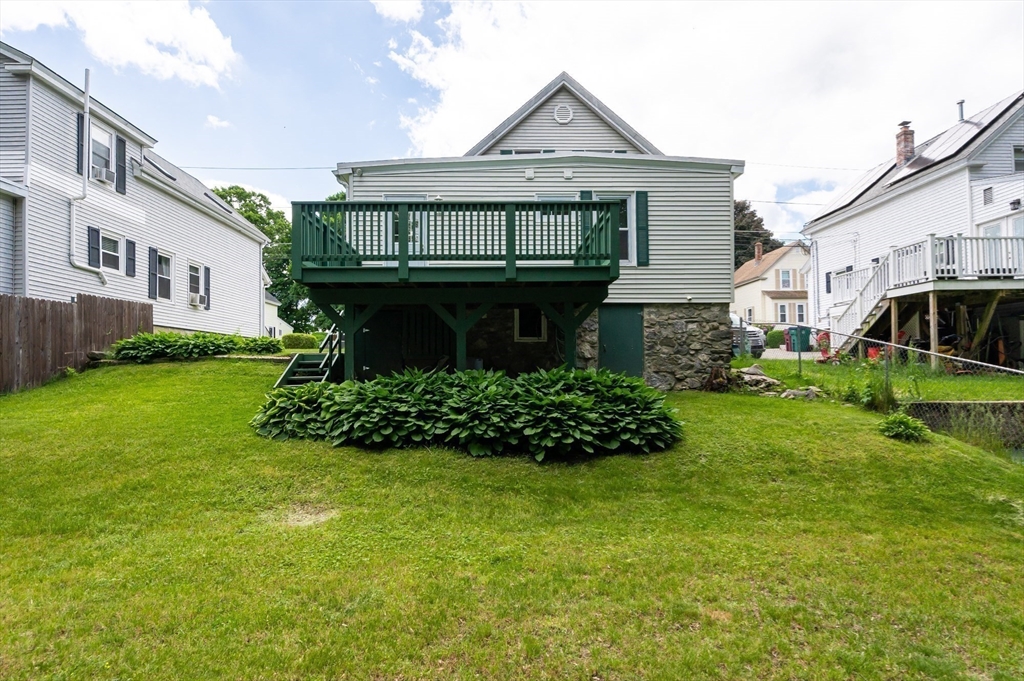 86 Epping Street Lowell, MA 01852 - Photo 38 of 41 a front view of a house with a garden
