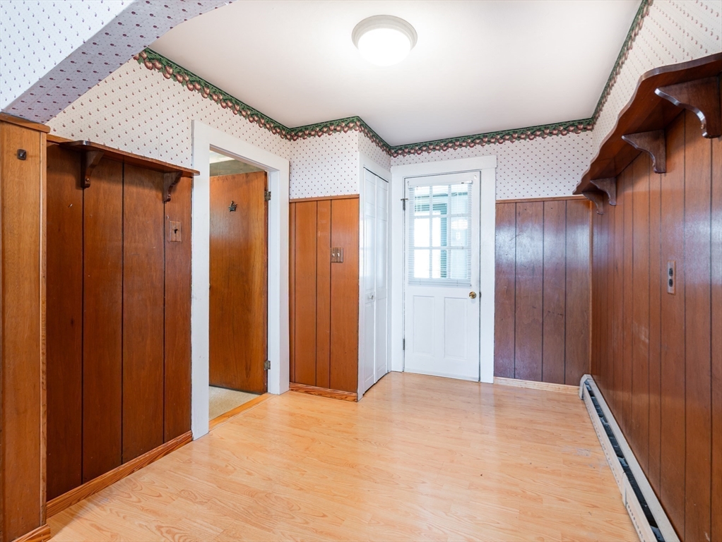 86 Epping Street Lowell, MA 01852 - Photo 7 of 41 a view of hallway with wooden floor