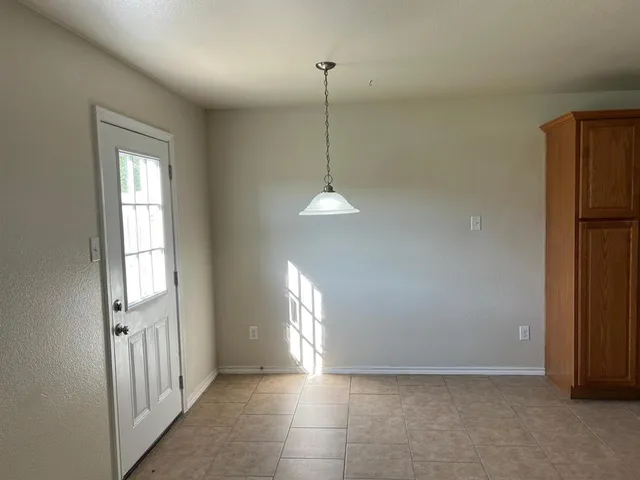 a view of a room with windows