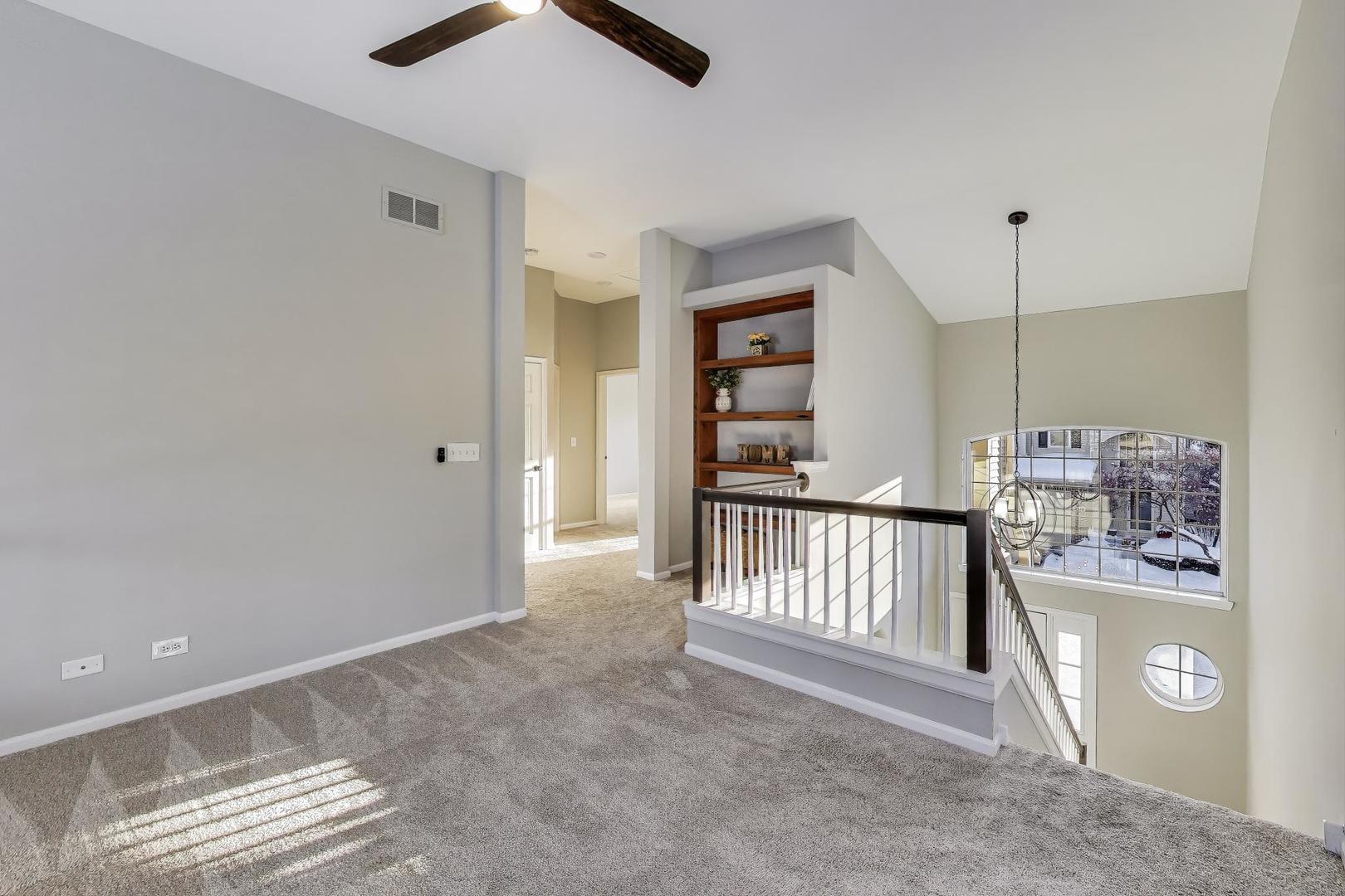 2304 Stonegate Road Algonquin, IL 60102 - Photo 19 of 42 a view of an empty room and window