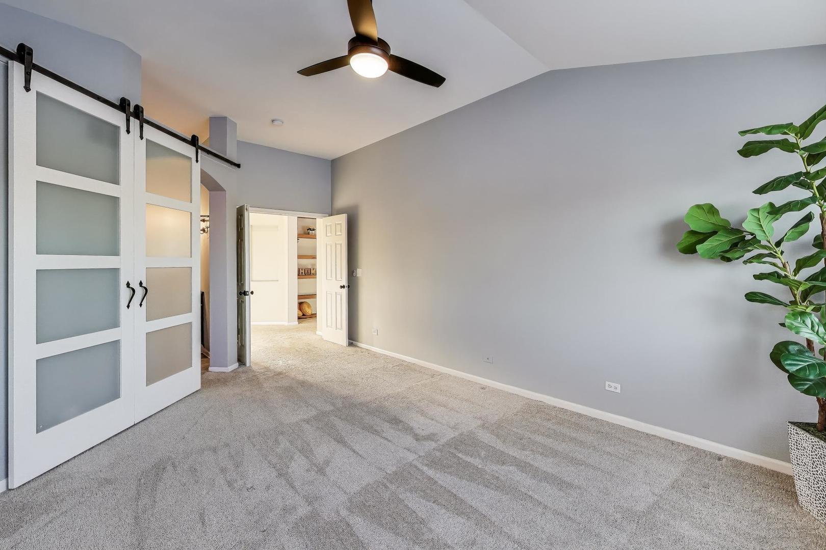 2304 Stonegate Road Algonquin, IL 60102 - Photo 22 of 42 a view of an empty room with a window