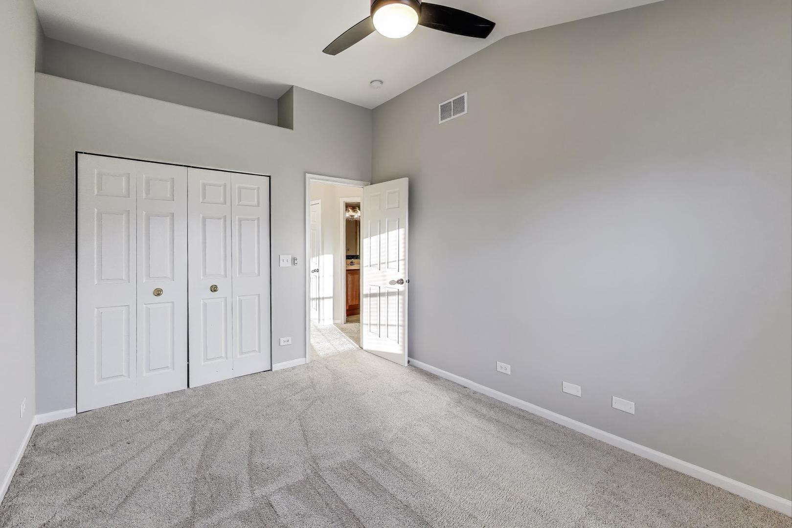 2304 Stonegate Road Algonquin, IL 60102 - Photo 28 of 42 wooden floor in an empty room