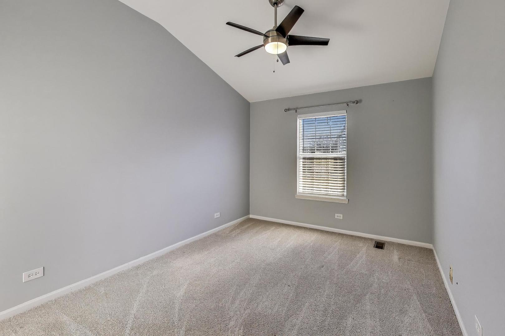 2304 Stonegate Road Algonquin, IL 60102 - Photo 30 of 42 a view of an empty room with a window