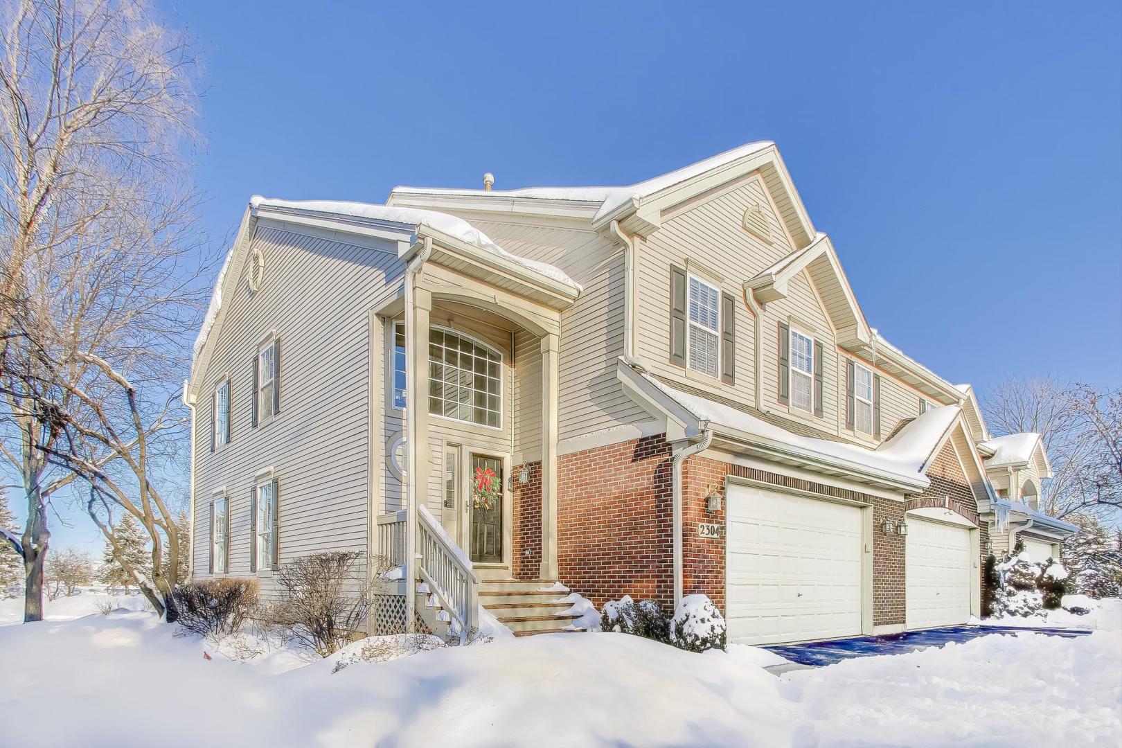 2304 Stonegate Road Algonquin, IL 60102 - Photo 3 of 42 a view of a house with a street