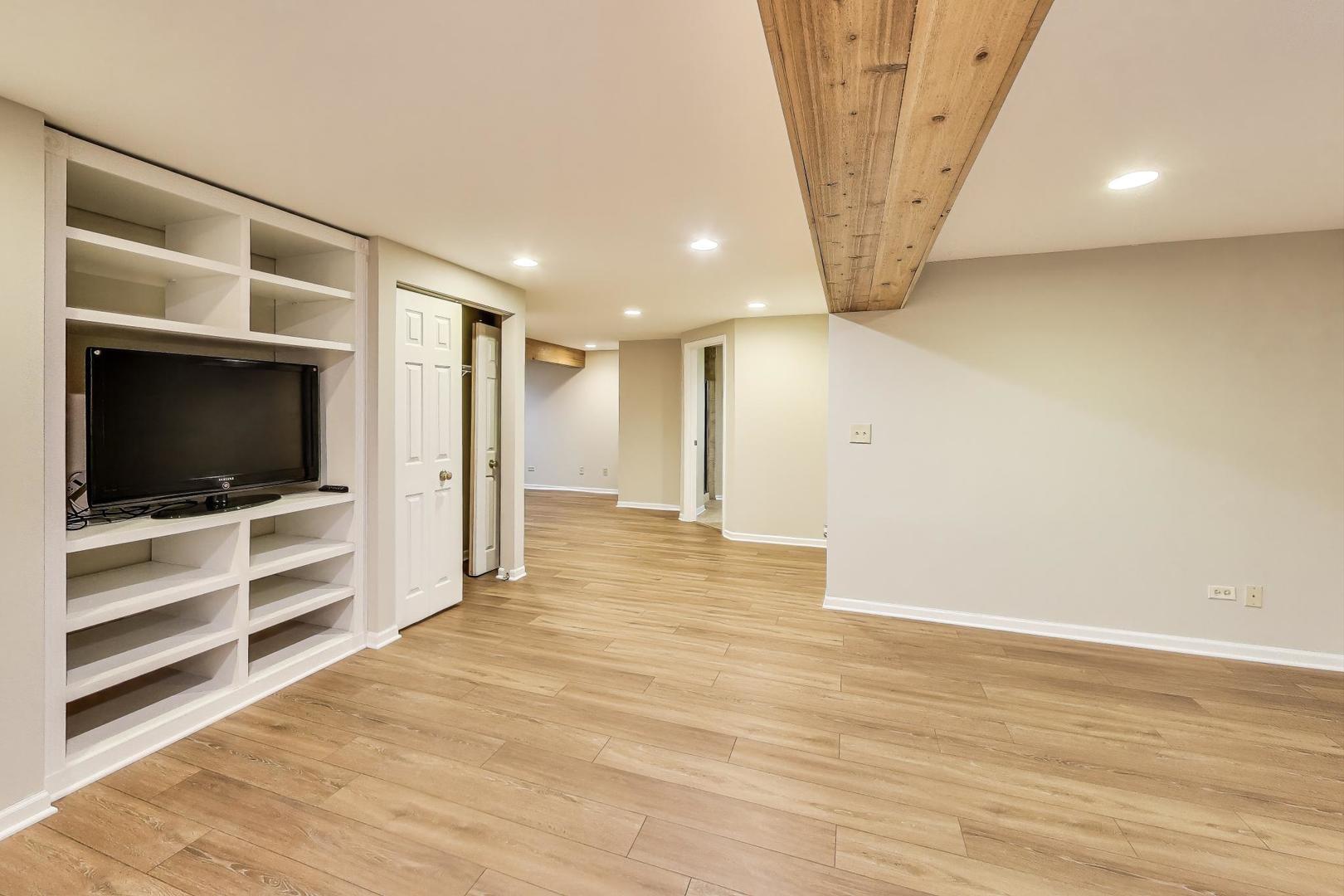2304 Stonegate Road Algonquin, IL 60102 - Photo 34 of 42 a view of a livingroom with an empty space