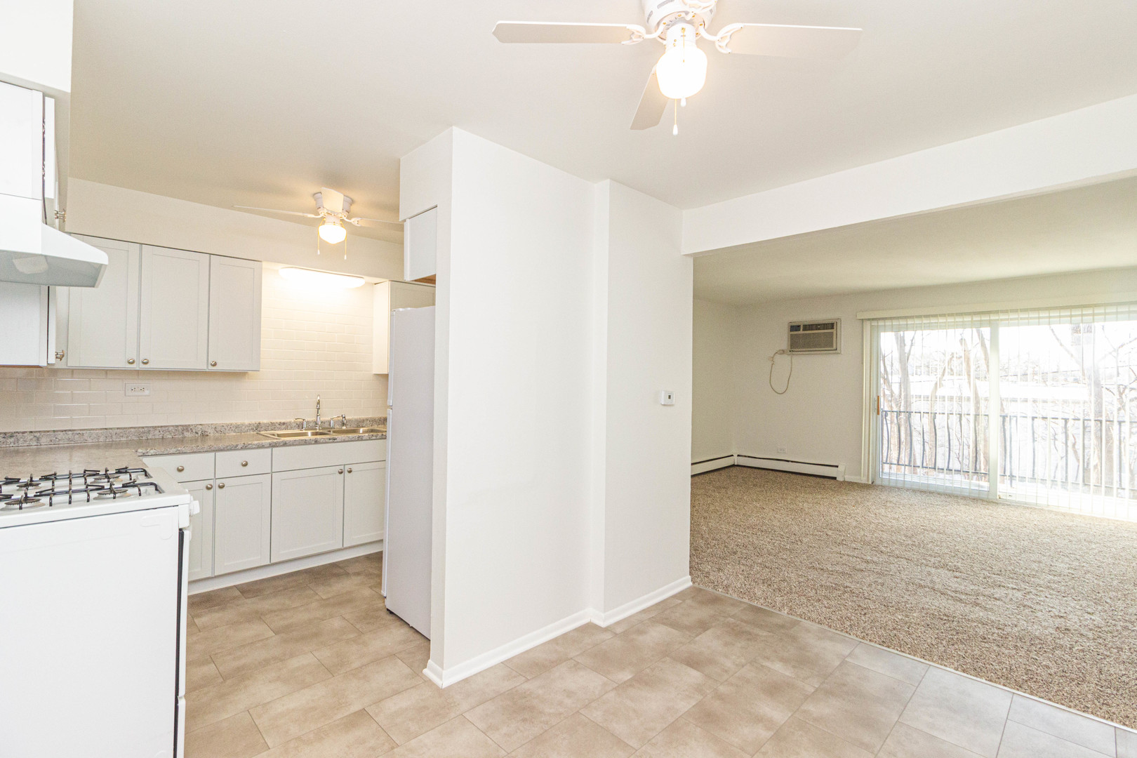 4819 West Engle Road, Unit 2D Alsip, IL 60803 - Photo 14 of 25 a view of a kitchen with a sink and cabinets
