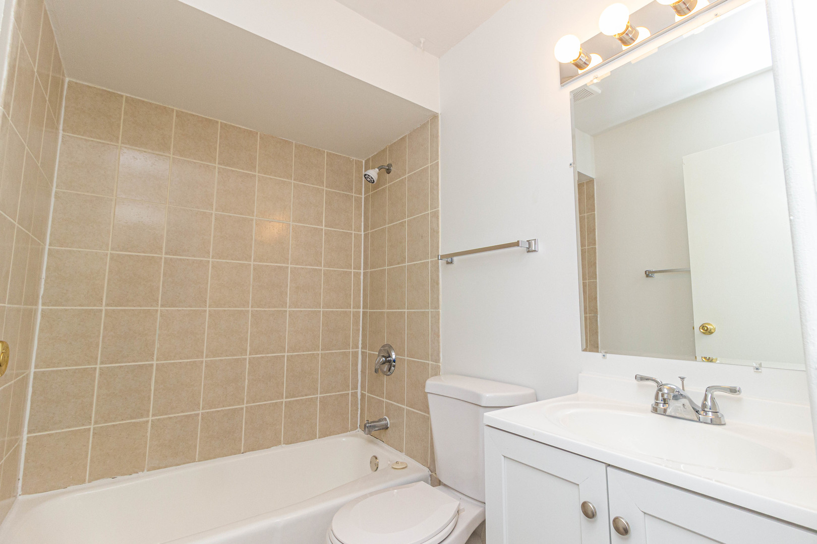 4819 West Engle Road, Unit 2D Alsip, IL 60803 - Photo 17 of 25 a bathroom with a sink toilet and shower