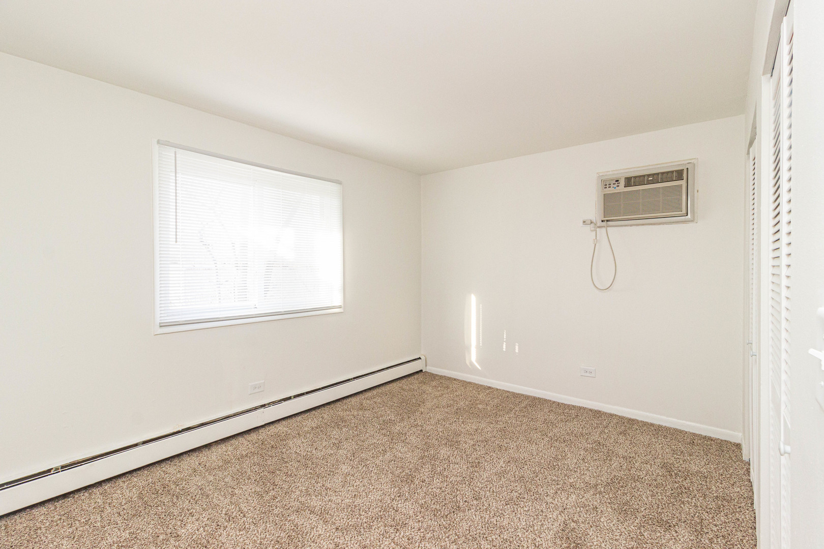 4819 West Engle Road, Unit 2D Alsip, IL 60803 - Photo 22 of 25 an empty room with windows