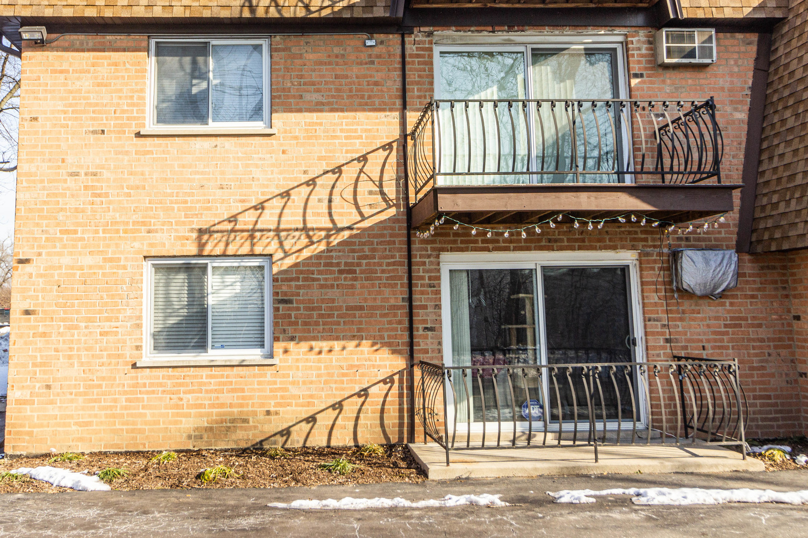 4819 West Engle Road, Unit 2D Alsip, IL 60803 - Photo 23 of 25 a view of a house with a wooden deck