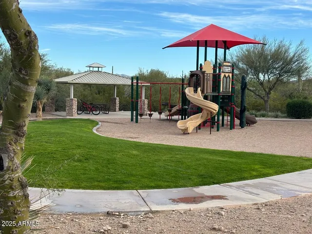 a view of a big yard with an outdoor space