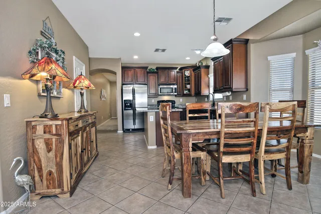 a view of a dining room with furniture