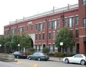 1229 West Madison Street, Unit F Chicago, IL 60607 - Photo 1 of 1 a car parked in front of a building