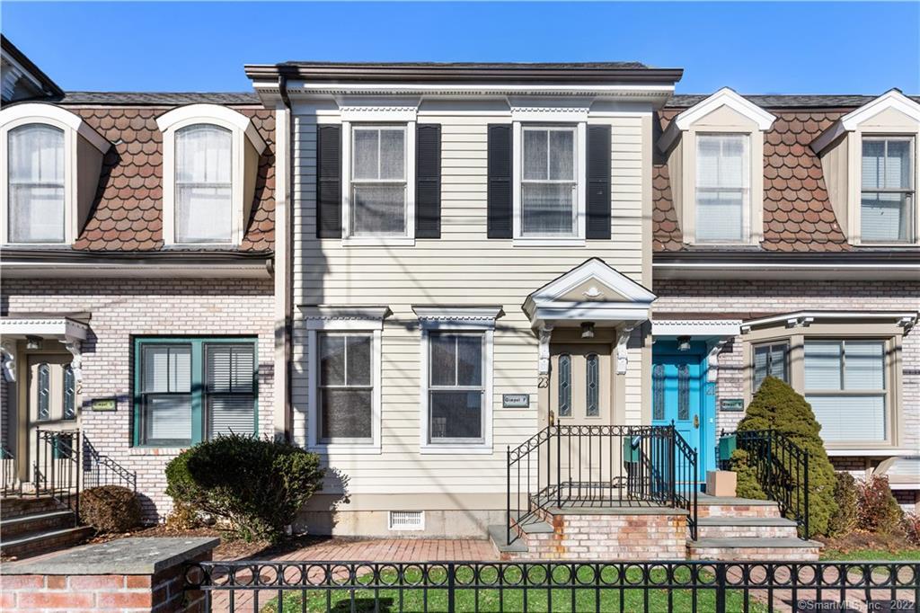a front view of a house with a porch