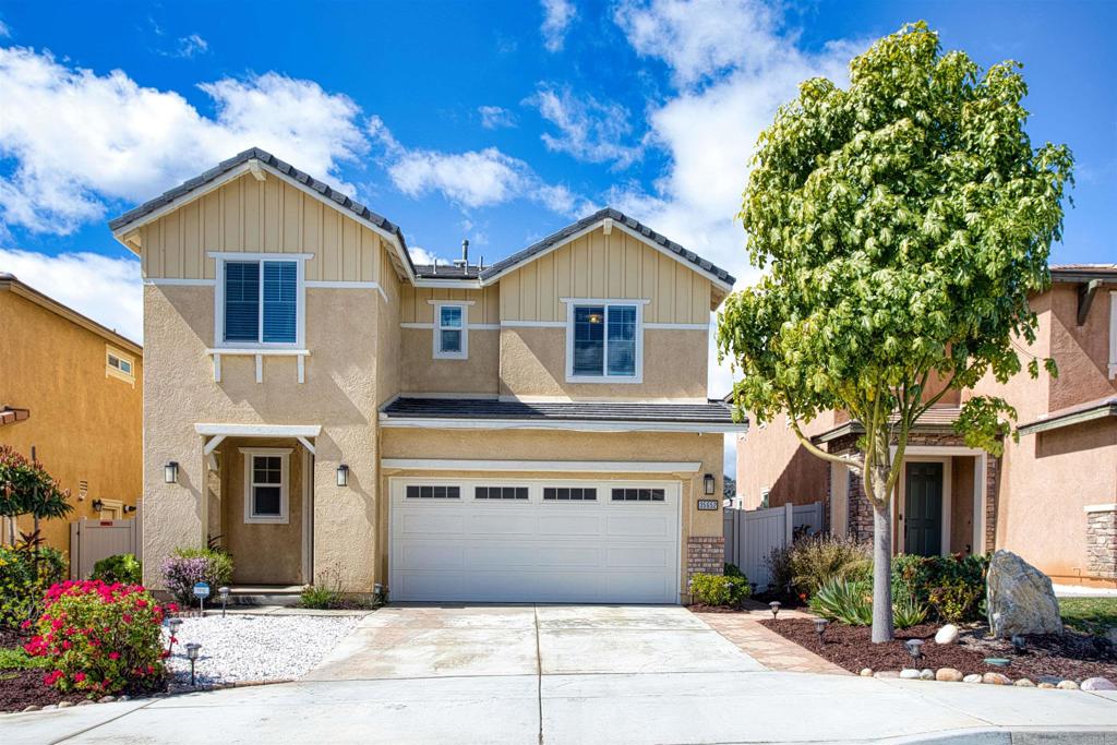 35652 Asturian Way Fallbrook, CA 92028 - Photo 2 of 34 a front view of a house with a garden