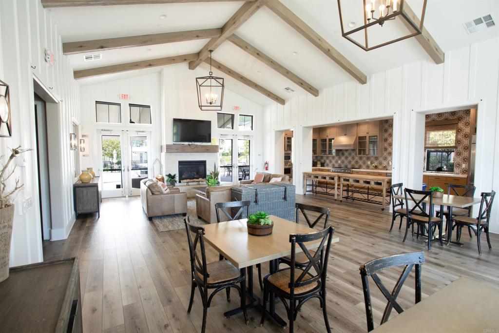 35652 Asturian Way Fallbrook, CA 92028 - Photo 31 of 34 a living room with fireplace furniture and a flat screen tv