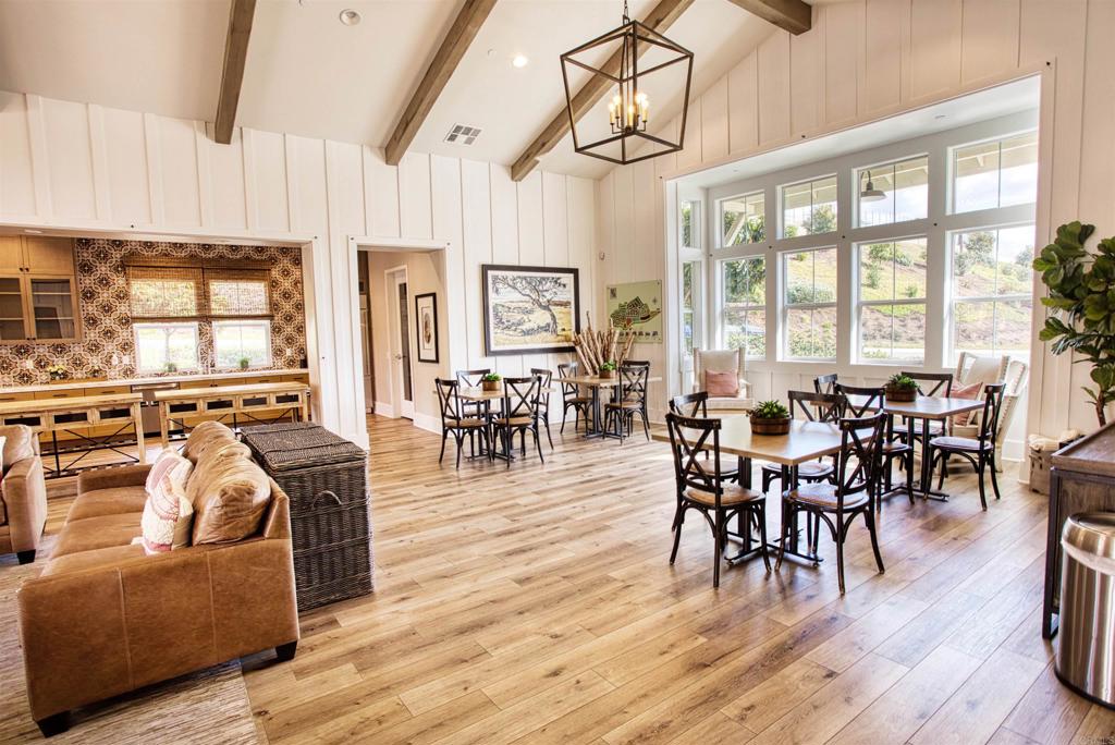 35652 Asturian Way Fallbrook, CA 92028 - Photo 32 of 34 a view of a dining room with furniture window and wooden floor