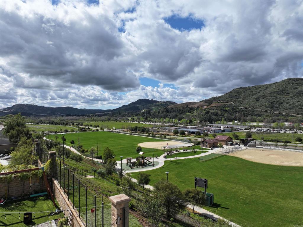 35652 Asturian Way Fallbrook, CA 92028 - Photo 4 of 34 a view of a lake with a yard