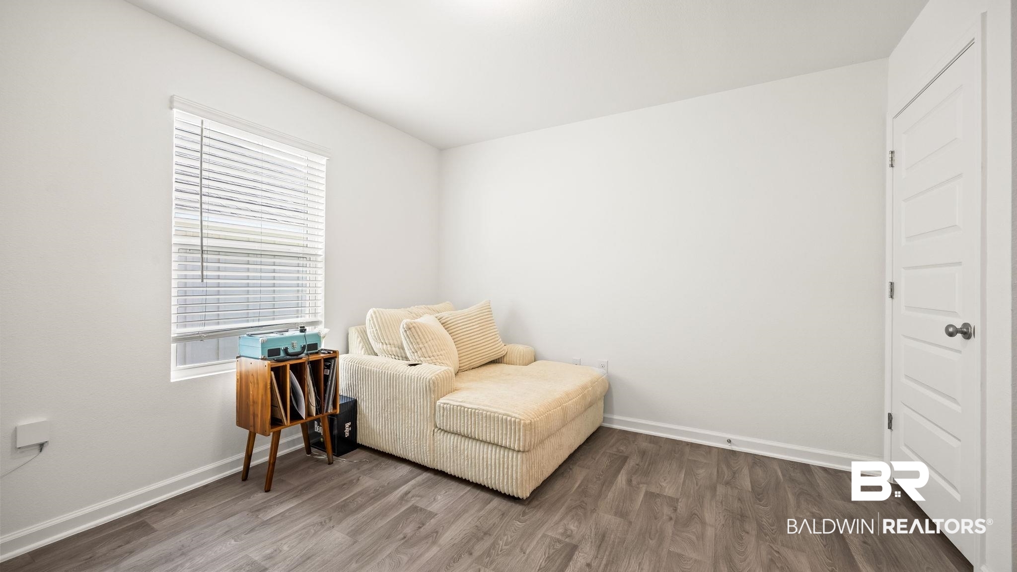 24264 Veranda Circle Elberta, AL 36530 - Photo 31 of 41 Sitting room with wood finished floors and baseboards