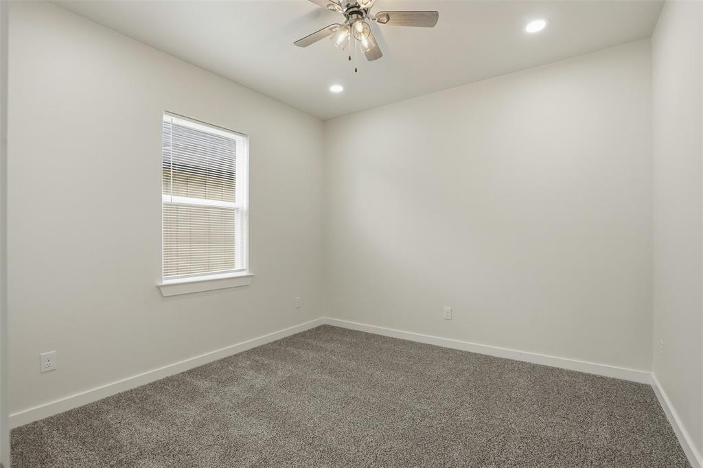 532 Highview Court Godley, TX 76044 - Photo 8 of 39 Carpeted interior space featuring a window with blinds, a ceiling fan with integrated lighting, and recessed ceiling lights