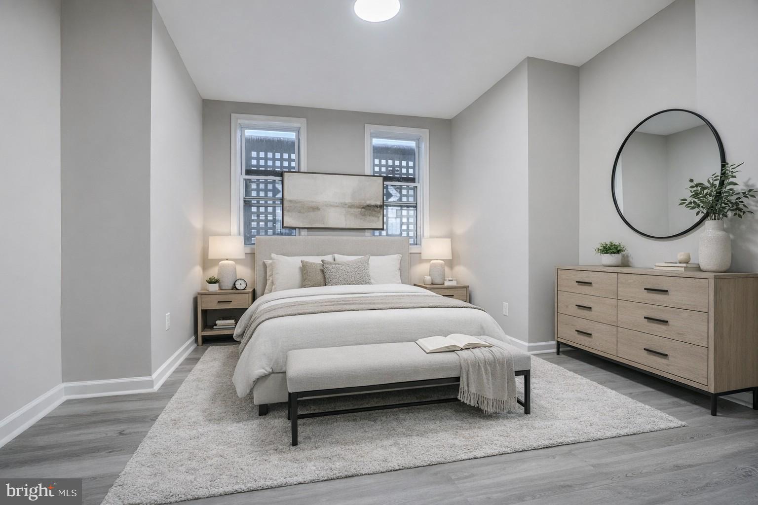 717 North Streeper Street Baltimore, MD 21205 - Photo 11 of 29 a bedroom with a bed and a dresser