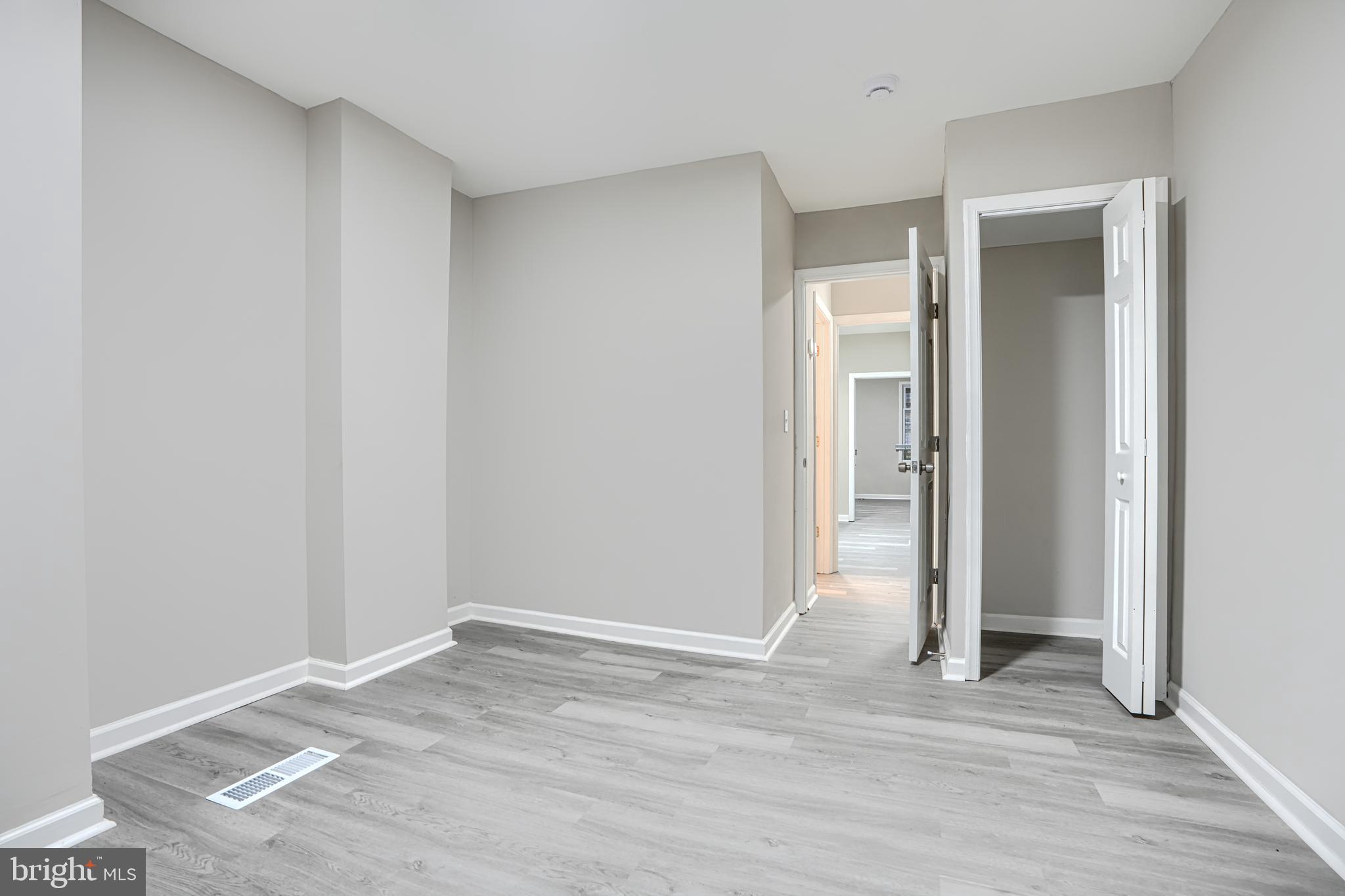 717 North Streeper Street Baltimore, MD 21205 - Photo 13 of 29 a view of a room with wooden floor