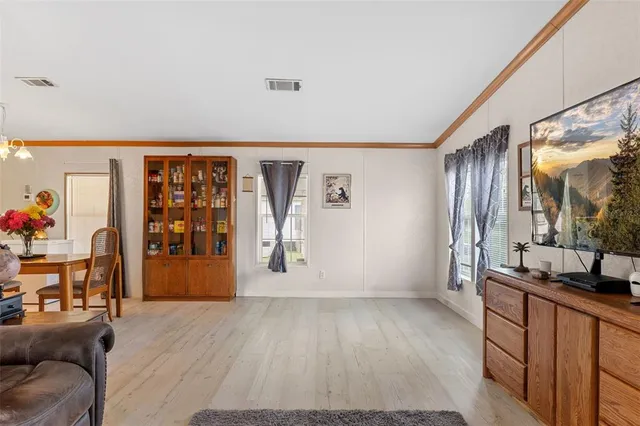 a bedroom with a bed and furniture