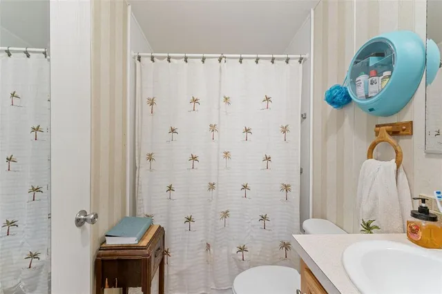 an aerial view of a house with a garden