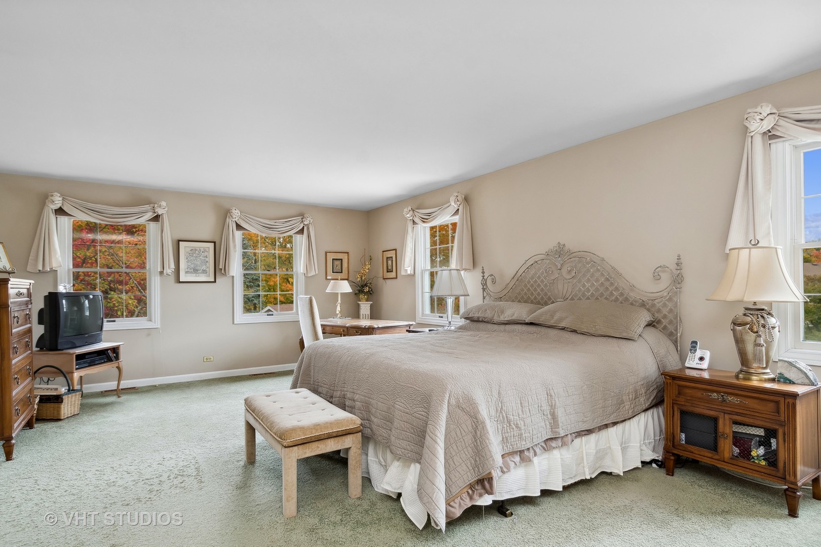 998 Landing Road Naperville, IL 60540 - Photo 11 of 18 a bedroom with a bed and a couch
