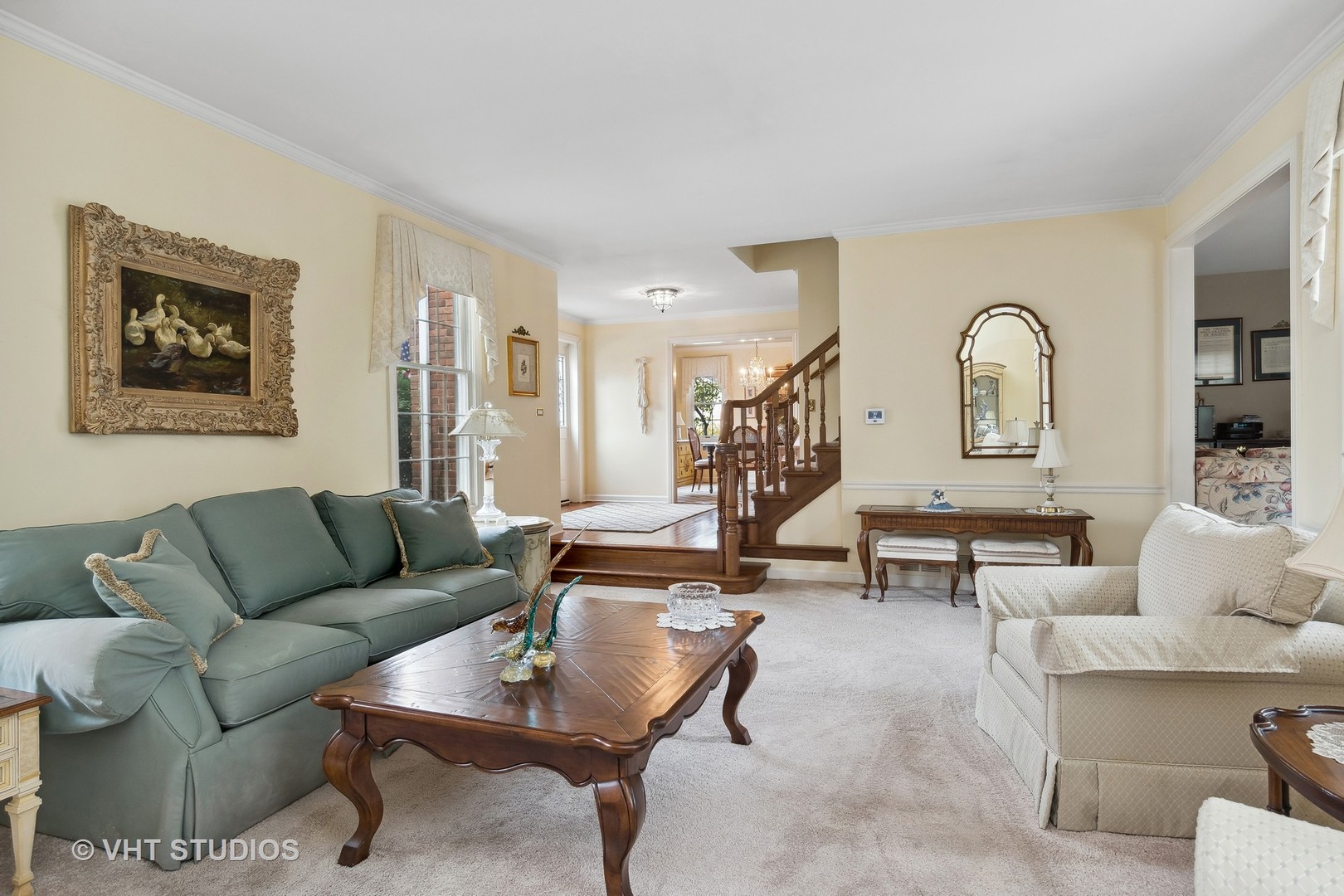 998 Landing Road Naperville, IL 60540 - Photo 4 of 18 a living room with furniture and a wooden floor
