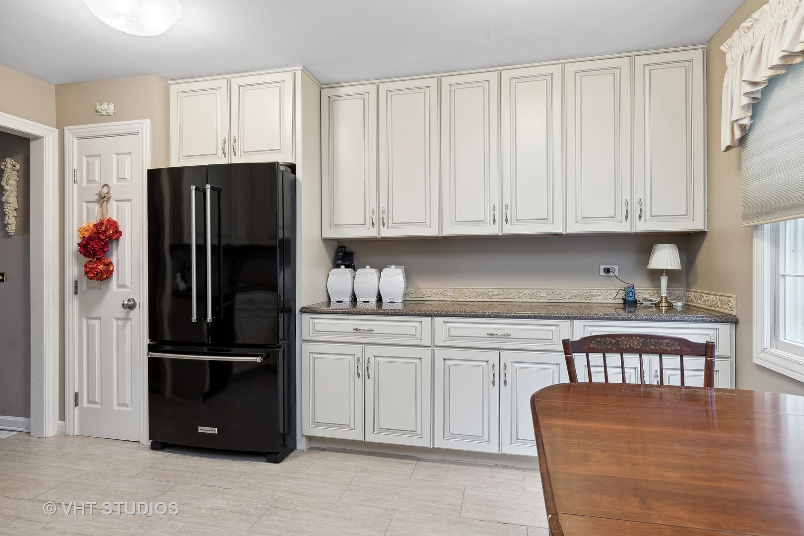 998 Landing Road Naperville, IL 60540 - Photo 6 of 18 a kitchen with stainless steel appliances granite countertop a refrigerator and a stove